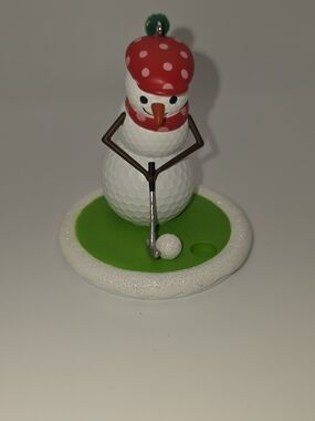 Hallmark White Golf Snowman Ornament with Red Hat and Green Base